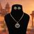 Sophisticated dark green color american diamond pendant set tailored for wedding guests