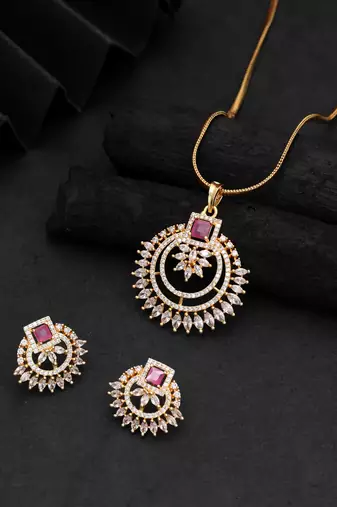 Charming deep rani color american diamond pendant set created for festive wear