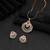 Charming deep rani color american diamond pendant set created for festive wear