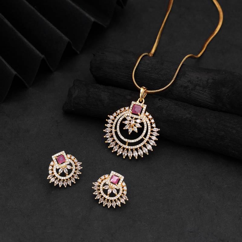 Charming deep rani color american diamond pendant set created for festive wear