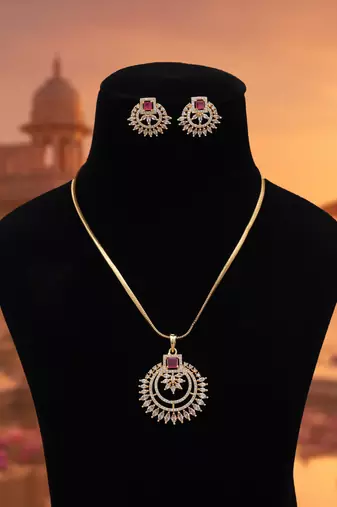 Charming deep rani color american diamond pendant set created for festive wear