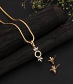 Radiant sheen gold color american diamond pendant set designed for evening celebrations