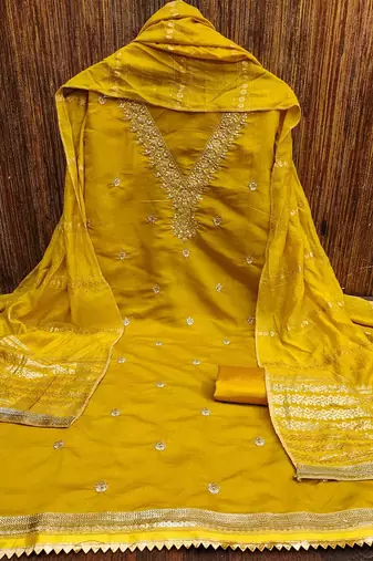 ethnic motifs embroidered sequinned unstitched dress material
