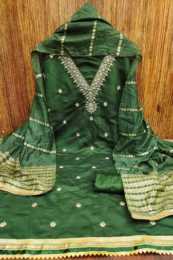 ethnic motifs embroidered sequinned unstitched dress material
