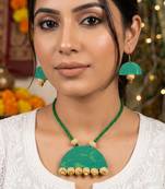 Lush natural green color fabric handcraft necklace set styled for festive outfits