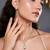 Pristine pure white color fashion chain pendant with earring set for modern dresses