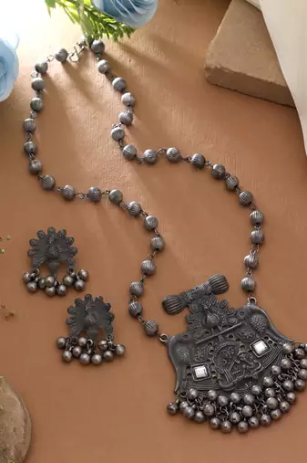 Graceful heritage silver color oxidised necklace set crafted for special gathering wear