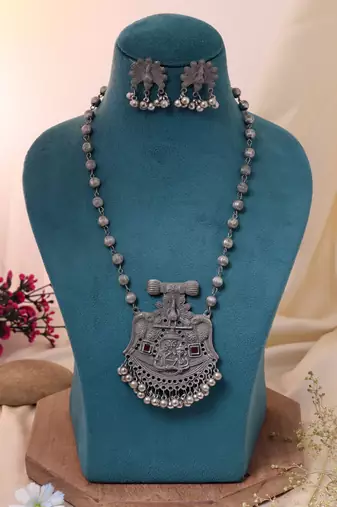 Graceful heritage silver color oxidised necklace set crafted for special gathering wear