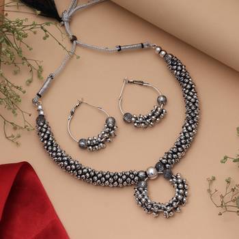 Graceful royal silver color oxidised necklace set styled for traditional saree pairing 1