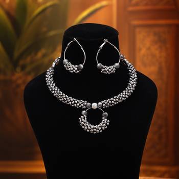 Graceful royal silver color oxidised necklace set styled for traditional saree pairing 2