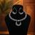 Graceful royal silver color oxidised necklace set styled for traditional saree pairing