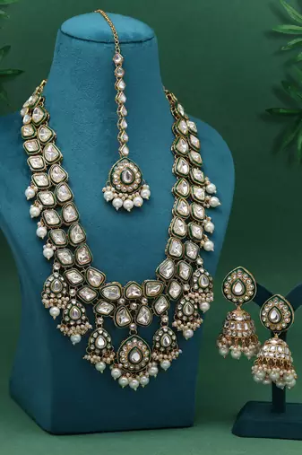 Pristine pearl white color kundan necklace set crafted for traditional wedding wear