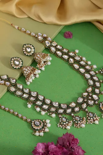 Pristine pearl white color kundan necklace set crafted for traditional wedding wear