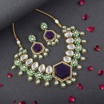 Royal imperial purple color kundan necklace set styled for special evening functions 1
