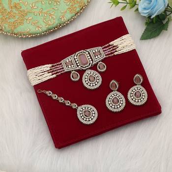 Soft light pink color choker kundan necklace set styled for minimalist elegance 1