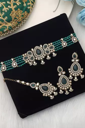 Teal rama green color choker kundan necklace set tailored for festive celebrations