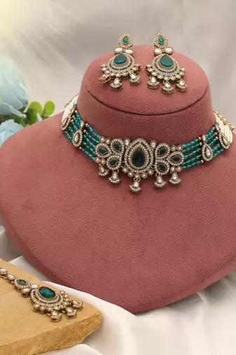 Teal rama green color choker kundan necklace set tailored for festive celebrations