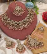 Charming baby light pink color kundan necklace set created for festive celebrations