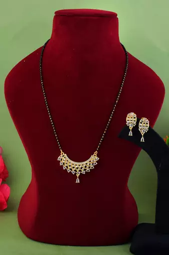 Lustrous sheen gold color american diamond mangalsutra crafted for wedding wear