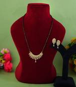 Lustrous sheen gold color american diamond mangalsutra crafted for wedding wear