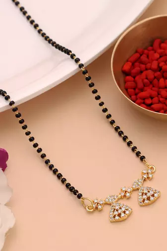 Radiant sheen gold color american diamond mangalsutra for elegant evening partywear