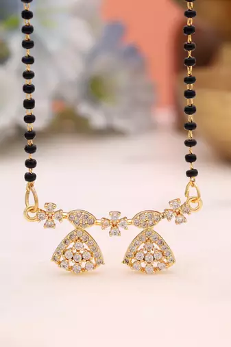 Radiant sheen gold color american diamond mangalsutra for elegant evening partywear