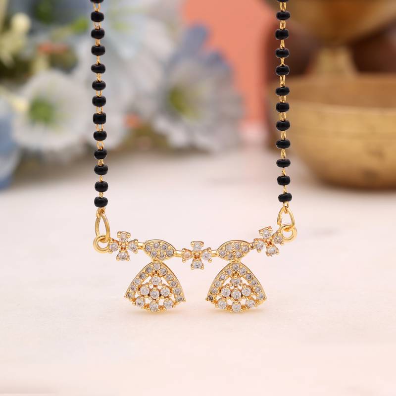 Radiant sheen gold color american diamond mangalsutra for elegant evening partywear