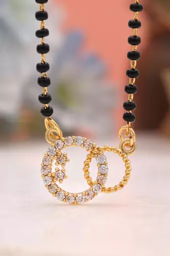 Timeless shining gold color american diamond mangalsutra perfect for ethnic outfits