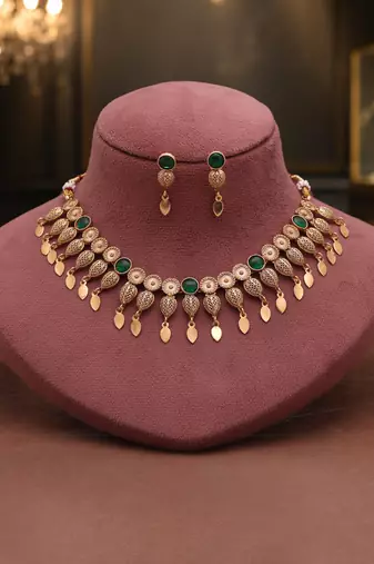 Traditional emerald green color matte gold necklace set with elegant dangle earrings