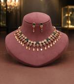 Traditional emerald green color matte gold necklace set with elegant dangle earrings