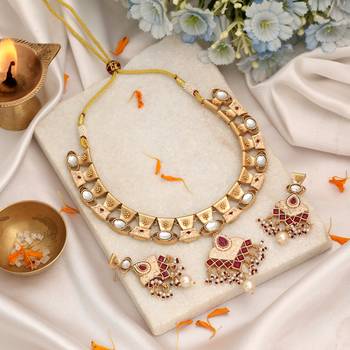 Soft blush pink color matte gold necklace set accompanied by dangle earrings 1