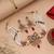 Charming soft pink color matte gold necklace set accompanied by dangle earrings