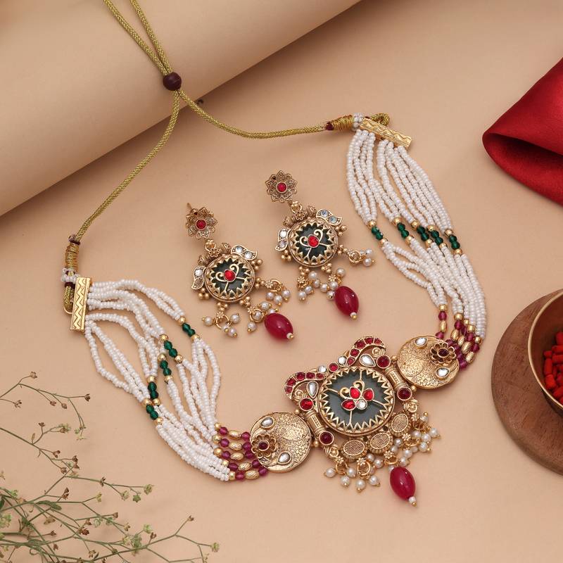 Charming soft pink color matte gold necklace set accompanied by dangle earrings