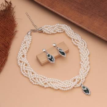 Lush royal green color stone necklace set designed for traditional celebration wear 1
