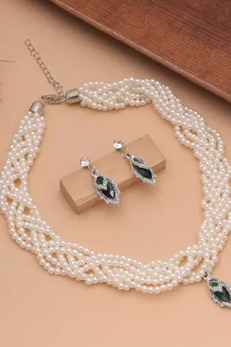 Lush royal green color stone necklace set designed for traditional celebration wear