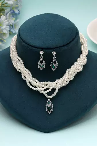 Lush royal green color stone necklace set designed for traditional celebration wear