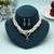 Lush royal green color stone necklace set designed for traditional celebration wear