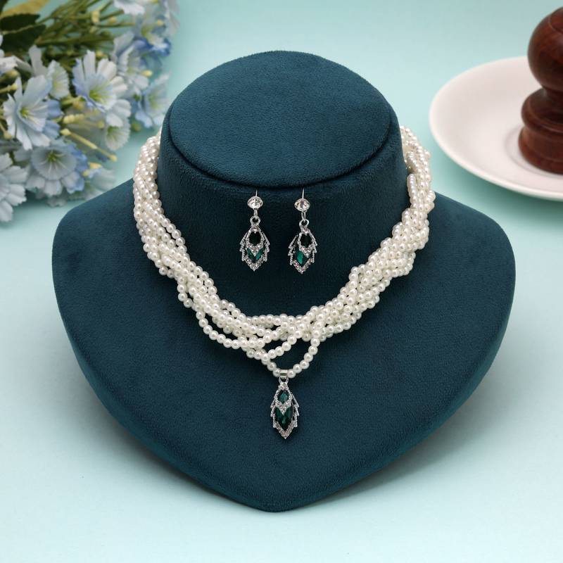 Lush royal green color stone necklace set designed for traditional celebration wear