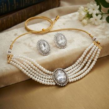 Pristine diamond white color stone necklace set styled for formal evening parties 1