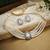 Pristine diamond white color stone necklace set styled for formal evening parties