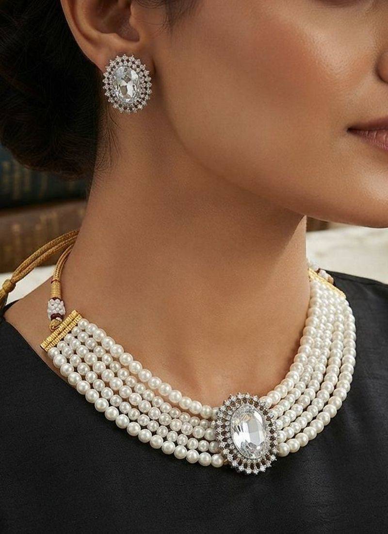 Pristine diamond white color stone necklace set styled for formal evening parties