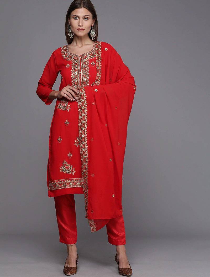 red & gold-toned embroidered unstitched dress material