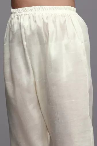 white & gold-toned embroidered unstitched dress material