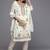 white & gold-toned embroidered unstitched dress material