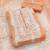 women orange & white embroidered organza unstitched dress material