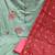 green & red embroidered unstitched dress material