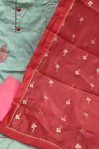green & red embroidered unstitched dress material