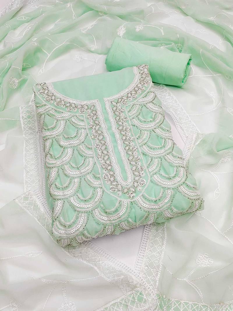 ethnic motifs embroidered beads and stones unstitched dress material