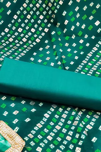 green embellished unstitched dress material