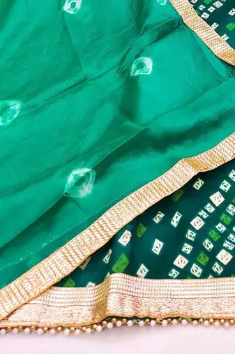 green embellished unstitched dress material